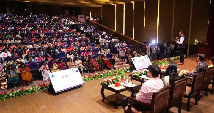 Industry Minister Col. Rajyavardhan Rathore interacting warmly with small business owners and MSME delegates at an economic summit.