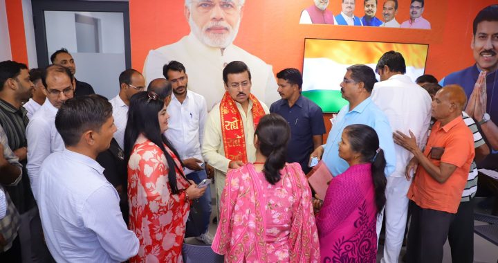 Col. Rajyavardhan Rathore listening intently to rural residents during an open-air Jan-Samvad session in a local village.