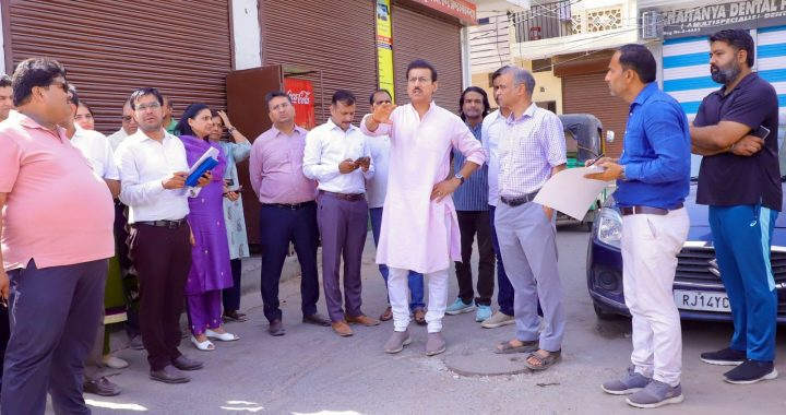 Col. Rajyavardhan Rathore interacting with local morning residents and reviewing a civic infrastructure site in Jhotwara at 7:30 AM.