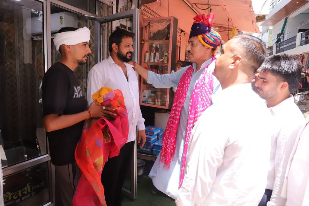 Rajasthan Industry Minister Col. Rajyavardhan Singh Rathore is visiting local stores and discussing development plans with trade union leaders in Jhotwara.