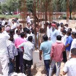 Graphic architectural layout and active construction site of the upcoming 100-bed multi-specialty Jhotwara Satellite Hospital in Jaipur, Rajasthan.