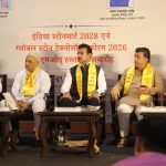 Rajasthan Industry Minister Col. Rajyavardhan Singh Rathore interacting with international delegates and tech startup founders at the India Stone Mart pavilion in Jaipur.