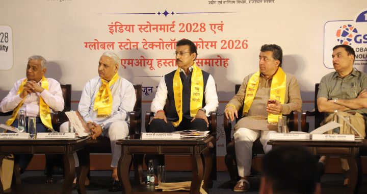 Rajasthan Industry Minister Col. Rajyavardhan Singh Rathore interacting with international delegates and tech startup founders at the India Stone Mart pavilion in Jaipur.