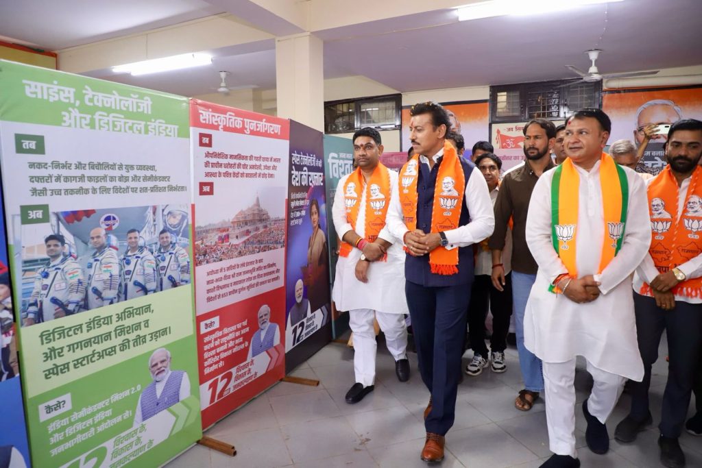 Cabinet Minister in Rajasthan Col. Rajyavardhan Singh Rathore, explaining regional development metrics and industrial progress reports during a public address in Jaipur.