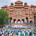 Rajasthan Sports Minister Col. Rajyavardhan Singh Rathore practicing yogasanas and addressing citizen groups at Patrika Gate on International Yoga Day 2026.