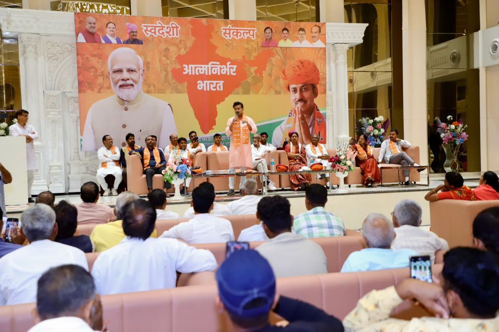 Rajyavardhan Rathore discussing PM Modi's mega development projects for Rajasthan