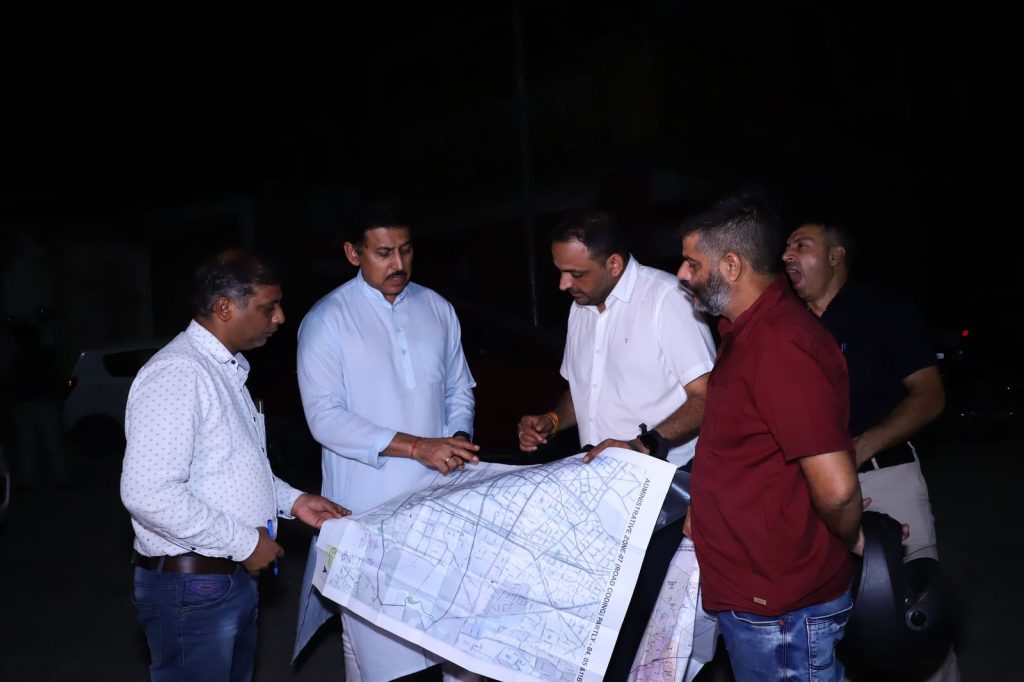 Rajyavardhan Singh Rathore announcing ₹10 crore road development projects in Jhotwara